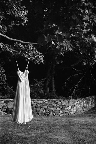 Hanging Dress and Stone Wall